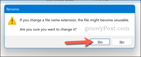 Confirmation du changement de nom d'une extension de fichier dans PowerPoint