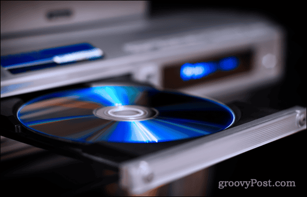 Insérer un DVD dans un lecteur DVD Insérer un DVD dans un lecteur DVD